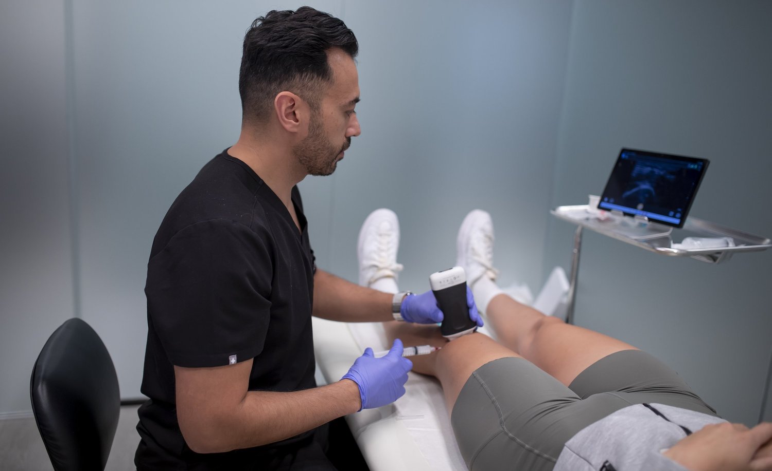 Dr. Abouali performing an ultrasound-guided injection